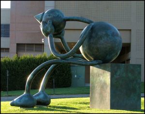 Outdoor sculpture of crying giant