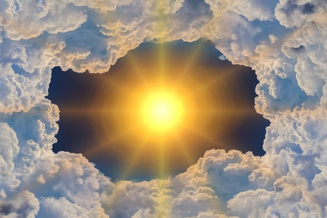Sun shining through a ring of clouds